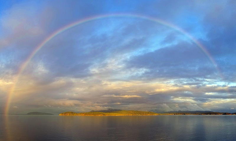 Rainbow over the San Juan Islands. Photo by Alex Shapiro.